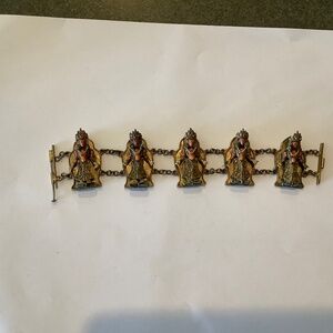 Tibetan/ Indian figure brass bracelet.